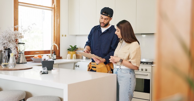 Woman, kitchen and plumber with contract on clipboard for maintenance service, information and repairs. 